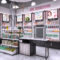 Shop Design Custom Metal Baking Paint Display Cabinet Display Rack for Shopping Mall Cosmetics Makeup & Skin Care Products