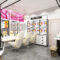 Shop Design Custom Metal Baking Paint Display Cabinet Display Rack for Shopping Mall Cosmetics Makeup & Skin Care Products
