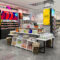 Modern Eco-Friendly for Iron Cosmetics Shop Door Middle Promotion Display Pile Head Island Table Display Cabinet Custom